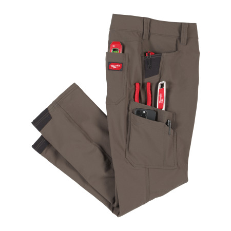 Pantalones de trabajo elásticos FREEFLEX™ marrones 54 - 1 unidad MILWAUKEE Ref.4932502056